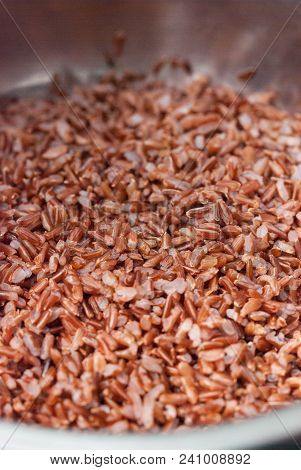 Saucepan Of Wild Red Rice Ready To Prepare. Food Cooking Process