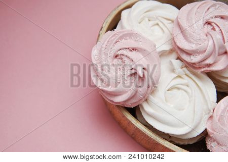 Pink Homemade Marshmallows Or Zephyr. Pink Strawberry Desert Over Pink Background.