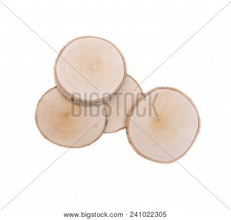 Sawn Birch Wooden Logs On Round Discs Isolated On White Background.