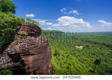 Beautiful Scenery Of The Sandstone Cliff With The Jungle And Blue Sky In The Background, Phu Sing, B
