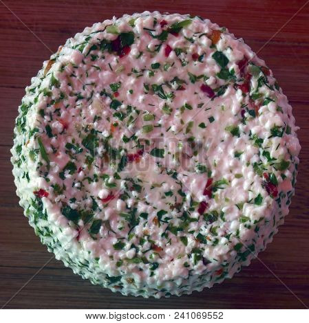 Cheese Curd With Vegetable Additives In The Form Of A Truncated Cone