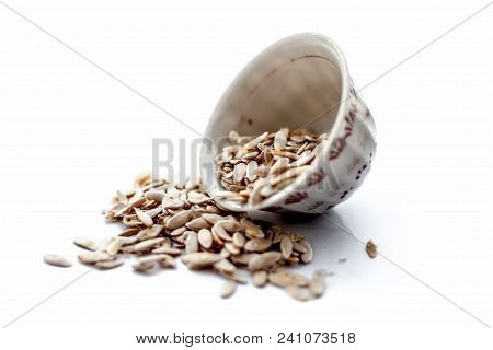 Edible Dried Raw Organic Seeds Of Musk Melon Or Cantaloupe Or Tati Or Honeydew  Isolated On White.