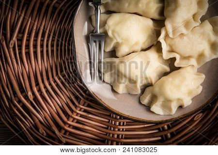 Homemade Dumplings With Cheese On A Plate. Top View.
