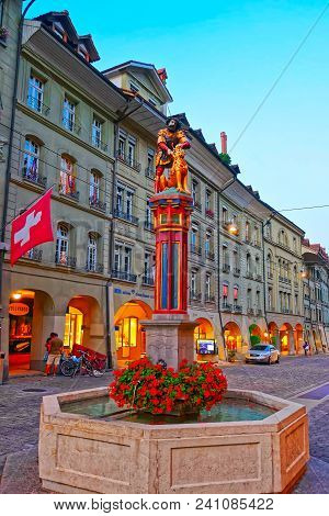 Bern, Switzerland - August 21, 2013: Samson Fountain At Kramgasse Street In Old City Center Of Bern,