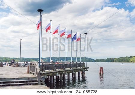Olsztyn, Poland - May 1, 2018: Polish And Eu Flags On Pier On Ukiel Lake.