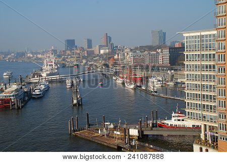 Aerial View Of Hamburg Port, A Sunny Day. The Port Of Hamburg Is A Sea Port On The River Elbe In Ham