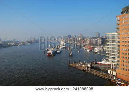 Aerial View Of Hamburg Port, A Sunny Day. The Port Of Hamburg Is A Sea Port On The River Elbe In Ham