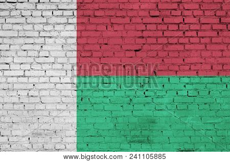 Madagascar Flag Is Painted Onto An Old Brick Wall