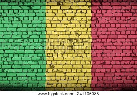 Mali Flag Is Painted Onto An Old Brick Wall