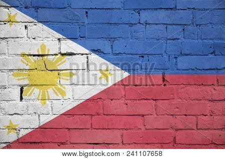 Philippines Flag Is Painted Onto An Old Brick Wall