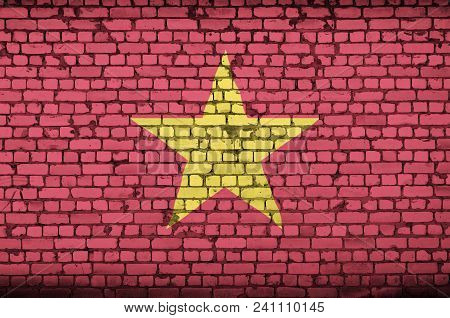 Vietnam Flag Is Painted Onto An Old Brick Wall