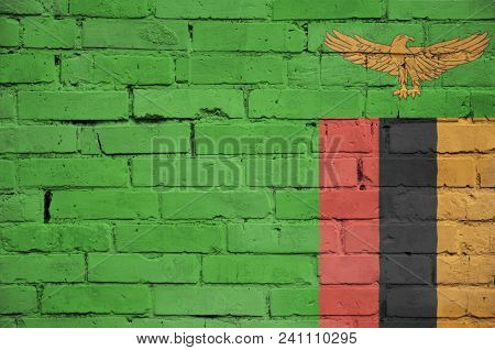 Zambia Flag Is Painted Onto An Old Brick Wall