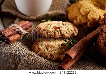 Cookies With Cinnamon And Tea On A Burlap Napkin, Selective Focus, Close-up, Top View. Delicious Tea
