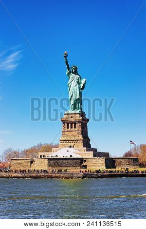 Liberty Island And Statue, Upper New York Bay, New York City, Usa. In Upper New York Bay. Tourists A