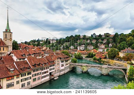 Bern, Switzerland - August 31, 2016: Nydegg Church With Unterbrucke Bridge Over Aare River In Bern, 