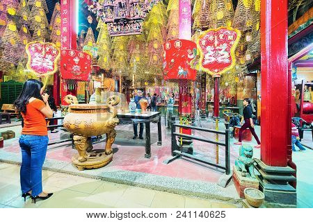 Can Tho, Vietnam - February 27, 2016: Woman Praying In Ong Temple In Can Tho, Vietnam