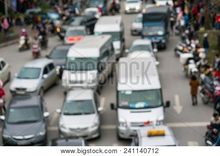 Aerial Blurred Image Of Traffic Jam In City. Urban Infrastructure Problem.