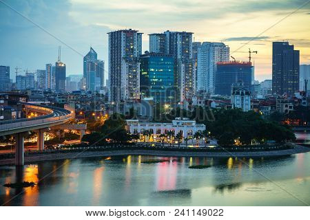 Aerial Skyline View Of Hanoi. Hanoi Cityscape At Twilight At Hoang Cau Lake