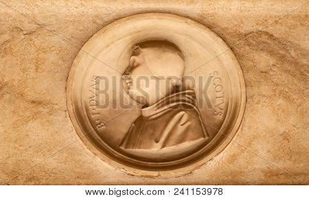 ROME, ITALY - SEPTEMBER 03: Blessed Duns Scotus, bass relief in portico of church dei Santi XII Apostoli in Rome, Italy on September 03, 2016.