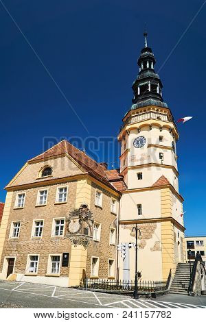 The Town Hall With Clock Tower And Market In Otmuchow