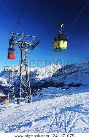 Cable Car Cabins In Winter Sport Resort In Swiss Alps In Mannlichen, Switzerland