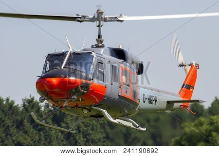 Ahlen, Germany - Jun 5, 2016: Civil Bell 212 Helicopter Landing At Ahlen-nord Heliport.