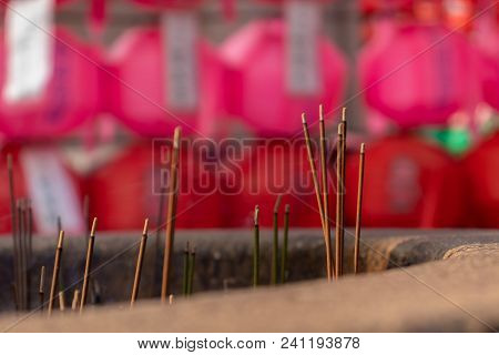 Asian Incense Sticks At A Buddhist Temple