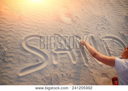 The Word Sand Is Written In The Sand