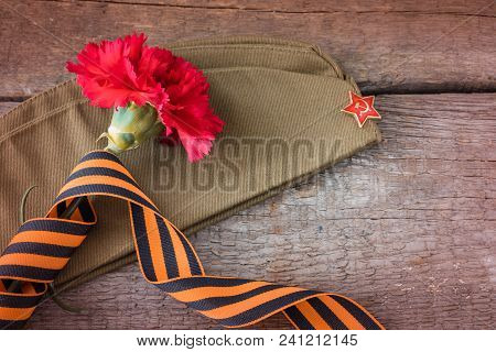The George Ribbon On The Field Cap, 9 May Victory Day Postcard Concept, Toned