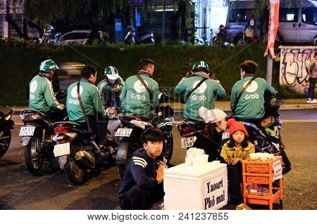 Dalat, Vietnam - May 1, 2018 :  Grab Bike, Motorcycle Taxi Waiting For Customer, Dalat Market At Nig