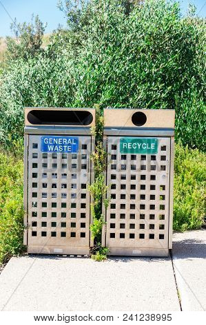 General Waste And Recycling Rubbish Bins Outdoors On A Sunny Day In Australia.