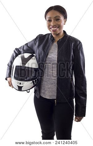 Confident Strong Black Female Holding A Helmet As A Race Car Driver, Motorcycle Biker Or A Stuntwoma