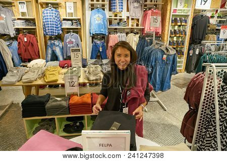 MILAN, ITALY - CIRCA NOVEMBER, 2017: seller inside Alcott store in Milan.