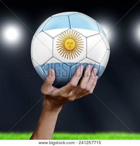 3d Illustration. Man Holding Soccer Ball With Argentinian Flag