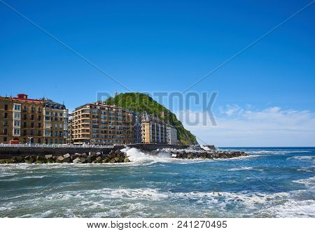 San Sebastian, Spain - May 10, 2018. Cantabrian Sea At The Mouth Of The Urumea River With Monte Urgu
