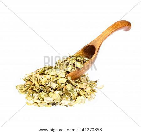 Dry Thlaspi Arvense On The Wooden Spoon. High Resolution Photo.