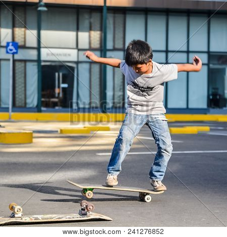 Bonifacio Global City, Taguig City, April 2, 2015: Skater Practicing In A Parking Lot In Bonifacio G