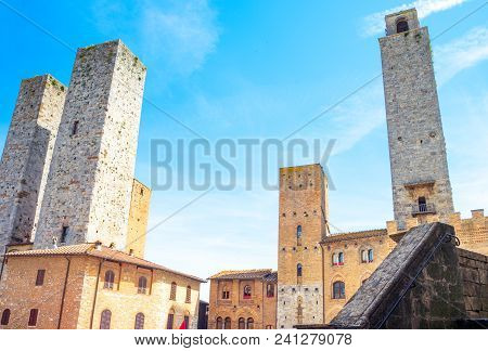 San Giminiano, Italy - May 26, 2016:  The Famous Medieval Towers Of The Old Town, Seen From Duomo Sq
