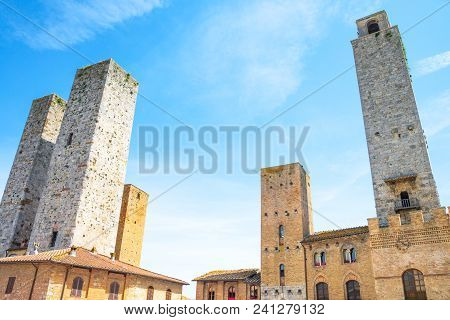 San Giminiano, Italy - May 26, 2016:  The Famous Medieval Towers Of The Old Town, Seen From Duomo Sq