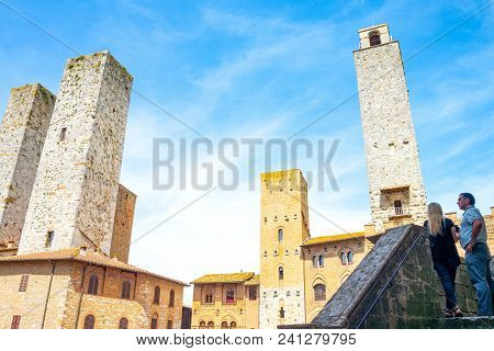 San Giminiano, Italy - May 26, 2016:  The Famous Medieval Towers Of The Old Town, Seen From Duomo Sq