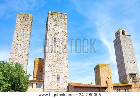 San Giminiano, Italy, The Famous Medieval Towers Of The Old Town, Seen From Delle Erbe Square