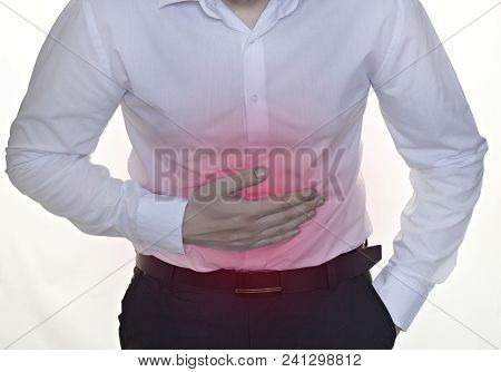 A Man In A White Shirt Holds On To The Belly, White Background