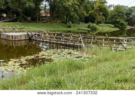 Wooden Bridge Across The Lake Kuching To Sarawak Culture Village