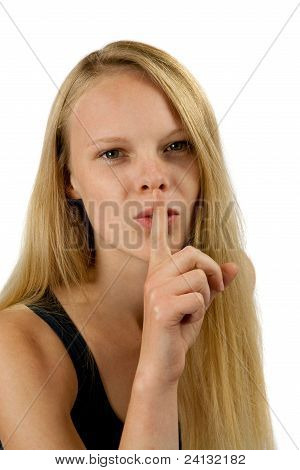 Young Girl Making Silence Gesture