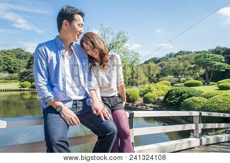Couple asian outdoor watching