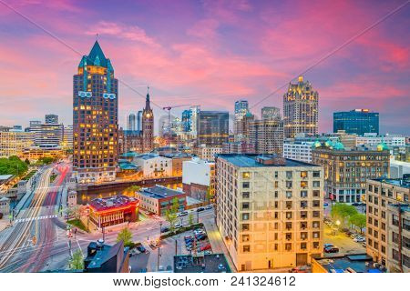 Milwaukee, WIsconsin, USA downtown skyline at dusk.
