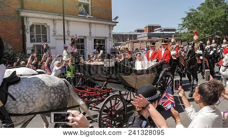 Windsor, England - May 19 2018: Prince Harry, Duke Of Sussex And Meghan, Duchess Of Sussex Leave Win