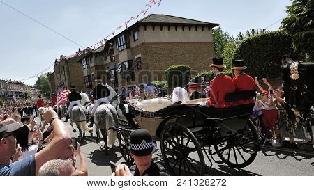 Windsor, England - May 19 2018: Prince Harry, Duke Of Sussex And Meghan, Duchess Of Sussex Leave Win