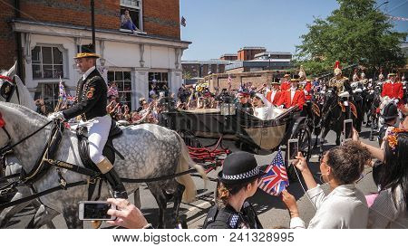 Windsor, England - May 19 2018: Prince Harry, Duke Of Sussex And Meghan, Duchess Of Sussex Leave Win