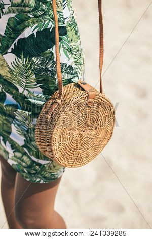 Woman With Fashionable Stylish Rattan Bag And Silk Scarf Outside. Tropical Island Of Bali. Rattan Ha